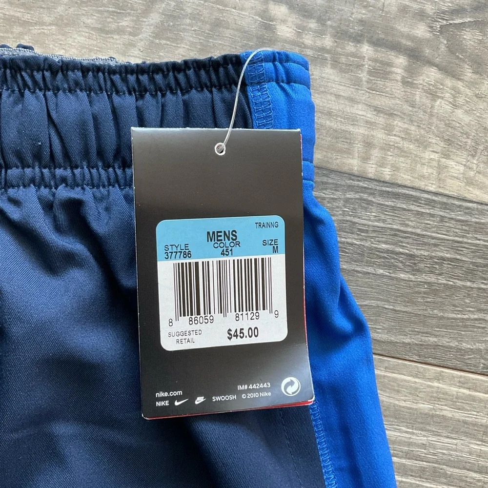 NWT Nike Team Woven Dri Fit Training Pants Men’s MEDIUM Blue Cord Hem 377786-451